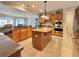 Spacious kitchen with granite countertops, stainless steel appliances, and large island at 310 Waterlily Way, Summerville, SC 29486