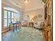 Cozy office space with large window, comfortable seating, and hardwood floors at 310 Waterlily Way, Summerville, SC 29486