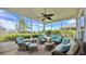 Screened in porch featuring comfortable seating with picturesque outdoor views at 310 Waterlily Way, Summerville, SC 29486