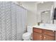 Functional bathroom with a shower, toilet, vanity with sink and mirror at 349 Waterlily Way, Summerville, SC 29486