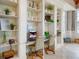 Business center featuring built-in shelves, computers and comfortable seating at 349 Waterlily Way, Summerville, SC 29486