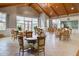 A spacious common area with tables, chairs, vaulted ceiling, and a coffee bar at 349 Waterlily Way, Summerville, SC 29486
