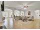 Open-concept living room with abundant natural light and smooth transition to dining area at 349 Waterlily Way, Summerville, SC 29486