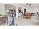 Open-concept living space showcases a stylish dining area with arched entryways at 349 Waterlily Way, Summerville, SC 29486