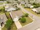 Aerial view of a well-maintained property with a lush green lawn in a planned community at 361 Waterlily Way, Summerville, SC 29486