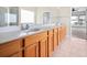 Gorgeous bathroom features a double sink vanity and ceramic tile flooring at 361 Waterlily Way, Summerville, SC 29486