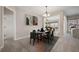 Dining room featuring a marble table with six chairs and stylish decor at 361 Waterlily Way, Summerville, SC 29486