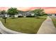 Expansive front lawn and landscaping create a welcoming curb appeal for this cozy, bright home at 361 Waterlily Way, Summerville, SC 29486