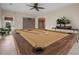 Relaxing game room featuring a wood billiard table, neutral decor, and access to other rooms at 361 Waterlily Way, Summerville, SC 29486