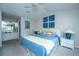 Stylishly decorated bedroom featuring a queen bed and a full ensuite bathroom at 408 Yacht Harbor Ct # Share 2, Isle of Palms, SC 29451