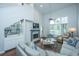 Relaxing living room area offers a fireplace, wet bar, and comfortable seating at 408 Yacht Harbor Ct # Share 2, Isle of Palms, SC 29451