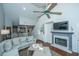 Bright living room features vaulted ceiling, fireplace, and wet bar for entertaining guests at 408 Yacht Harbor Ct # Share 2, Isle of Palms, SC 29451