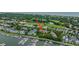 Aerial view of the community featuring a marina, a golf course, and swimming pool at 408 Yacht Harbor Ct # Share 4, Isle of Palms, SC 29451