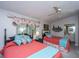 Bedroom with two beds, ceiling fan, and a window with natural light at 408 Yacht Harbor Ct # Share 4, Isle of Palms, SC 29451