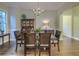 Dining room with hardwood floors, traditional furnishings, and soft, neutral colors at 4385 Ten Shillings Way, Ravenel, SC 29470