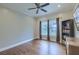 This office features hardwood floors, natural light, built-in bookshelves, and traditional furnishings at 4385 Ten Shillings Way, Ravenel, SC 29470