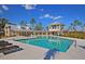 Stunning pool area with a gazebo, lounge chairs, and beautifully landscaped surroundings for ultimate relaxation at 4385 Ten Shillings Way, Ravenel, SC 29470