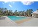Large pool with shallow sandy area, lounge seating and plenty of space for community fun at 4385 Ten Shillings Way, Ravenel, SC 29470