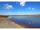Expansive water view with marshy shore provides a serene natural backdrop, perfect for outdoor enthusiasts at 4385 Ten Shillings Way, Ravenel, SC 29470