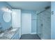 Bathroom includes a single sink vanity with granite countertop and frameless glass shower at 4991 Lake Palmetto Ln, North Charleston, SC 29418