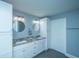 Bathroom features a double sink vanity with granite countertop and plenty of cabinet space at 4991 Lake Palmetto Ln, North Charleston, SC 29418
