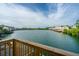 Beautiful lake view showcasing the water, townhomes, and surrounding greenery at 4991 Lake Palmetto Ln, North Charleston, SC 29418