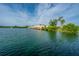 Wonderful lake view featuring the water and townhomes along the shore on a sunny day at 4991 Lake Palmetto Ln, North Charleston, SC 29418