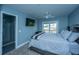 Inviting primary bedroom with balcony and modern ensuite bathroom with a walk-in shower at 4991 Lake Palmetto Ln, North Charleston, SC 29418