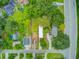 Aerial view of homes showing the tree coverage and proximity to the street at 501 Joseph St, Charleston, SC 29412