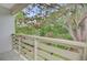 Balcony view showcasing lush green trees and a peaceful environment at 501 Joseph St, Charleston, SC 29412