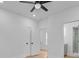 Bright bedroom featuring a ceiling fan, closet, and a bathroom with shower at 501 Joseph St, Charleston, SC 29412