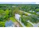 Exterior aerial shot featuring a modern house with a well-manicured lawn, ample parking, and a charming neighborhood setting at 501 Joseph St, Charleston, SC 29412