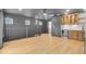 Upstairs loft area with hardwood floors, wet bar, and views of the backyard at 501 Joseph St, Charleston, SC 29412