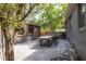 Private backyard patio with a large outdoor dining table, ideal for al fresco meals and gatherings at 5065 Durant Ave, North Charleston, SC 29405
