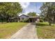 Attractive home with a well-maintained front lawn and driveway, showcasing curb appeal at 5065 Durant Ave, North Charleston, SC 29405