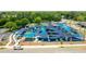 Aerial view of a vibrant playground with colorful shade structures and modern play equipment for children at 5104 E Liberty Park Cir, North Charleston, SC 29405