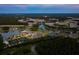 A birds-eye view of the neighborhood showing the layout and nearby amenities like lakes and green spaces at 629 Marsh Cove Cir, Summerville, SC 29486
