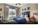 Bright bedroom with large window and neighborhood view at 629 Marsh Cove Cir, Summerville, SC 29486