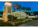 The welcoming entrance to Four Seasons at Lakes of Cane Bay with lush landscaping and inviting signage at 629 Marsh Cove Cir, Summerville, SC 29486