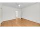 Bright bedroom featuring hardwood floors, a ceiling fan, white walls and trim, and natural light at 701 Hibbens Grant Blvd, Mount Pleasant, SC 29464