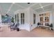 Relaxing front porch features blue ceilings, large windows and a 'welcome' mat at 701 Hibbens Grant Blvd, Mount Pleasant, SC 29464