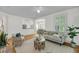 Cozy living room filled with natural light, opening up to kitchen and dining room at 701 Hibbens Grant Blvd, Mount Pleasant, SC 29464