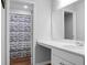 Bathroom with a white vanity, a modern faucet, and a shower with a curtain at 717 Butter Rd, Bonneau, SC 29431