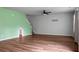 Open concept living room with hardwood floors, light wall color, and plenty of space at 717 Butter Rd, Bonneau, SC 29431