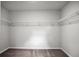 Empty walk-in closet with wire shelving and carpet flooring at 717 Butter Rd, Bonneau, SC 29431