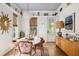 Charming dining room with unique decor, natural light, and a comfortable seating arrangement at 732 Gate Post Dr, Mount Pleasant, SC 29464