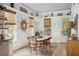 Bright dining room with natural light, stylish decor, and a comfortable seating arrangement at 732 Gate Post Dr, Mount Pleasant, SC 29464