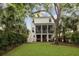 Spacious backyard with a screened porch and ample green space at 732 Gate Post Dr, Mount Pleasant, SC 29464