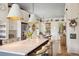 Spacious kitchen with a large island, stainless steel appliances, and open dining area at 732 Gate Post Dr, Mount Pleasant, SC 29464