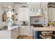 Well-appointed kitchen boasts ample counter space, custom cabinetry, and stainless steel appliances at 732 Gate Post Dr, Mount Pleasant, SC 29464
